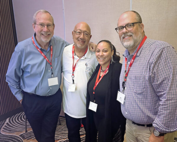 Fr. Mike Graham, SJ, ISP board member and Delegate for Higher Education at the Jesuit Conference of Canada and the United States, with ISP alumni leaders Kevin Graves and Angelica Santana, and ISP Regional Director Jim Broderick-King.